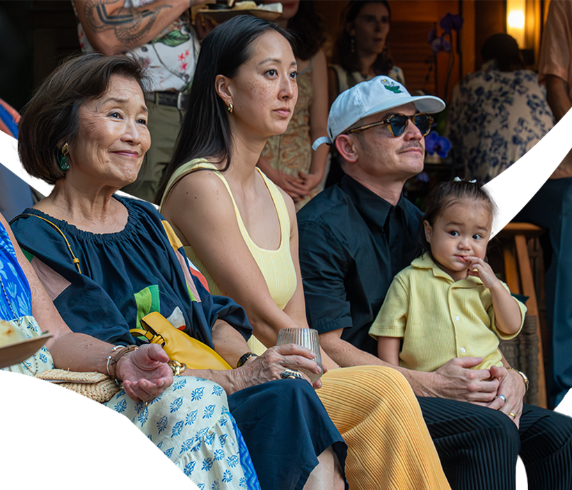 Guests of multiple generations gather together at a Studios event.